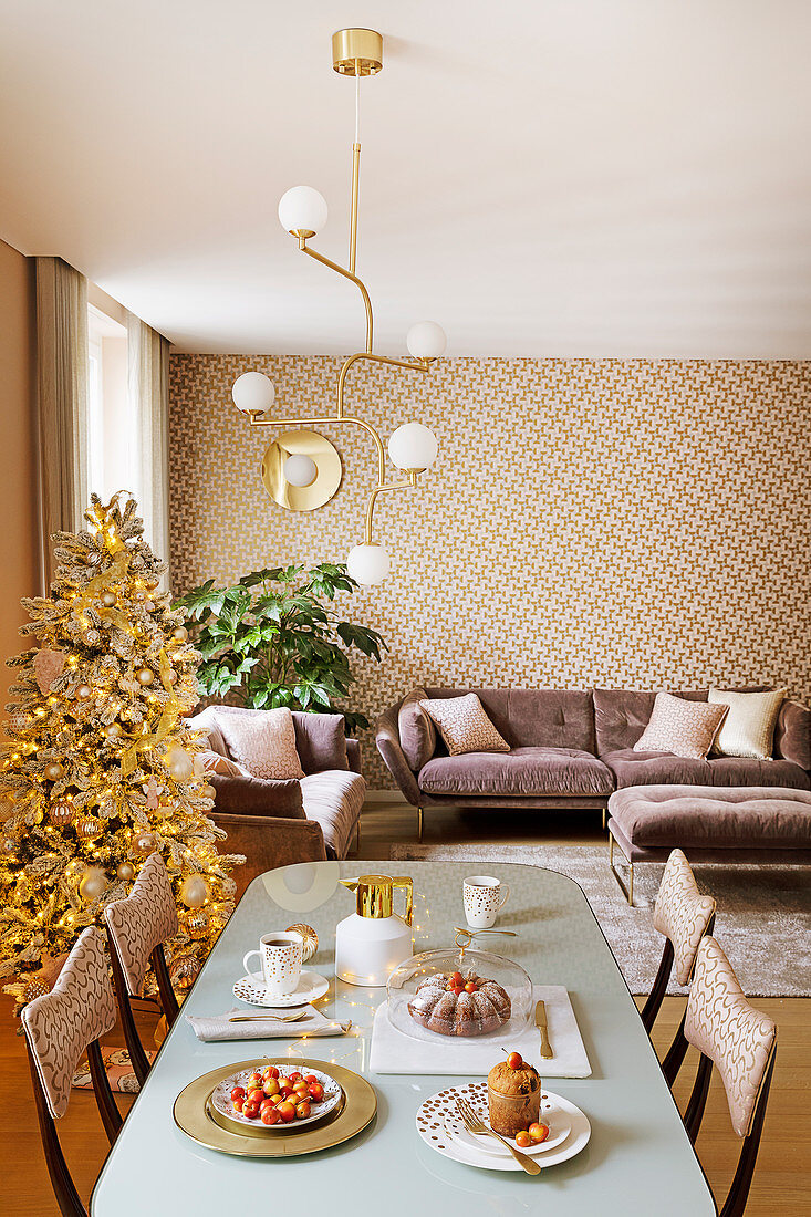 Elegant interior decorated in pink, gold and mauve at Christmas