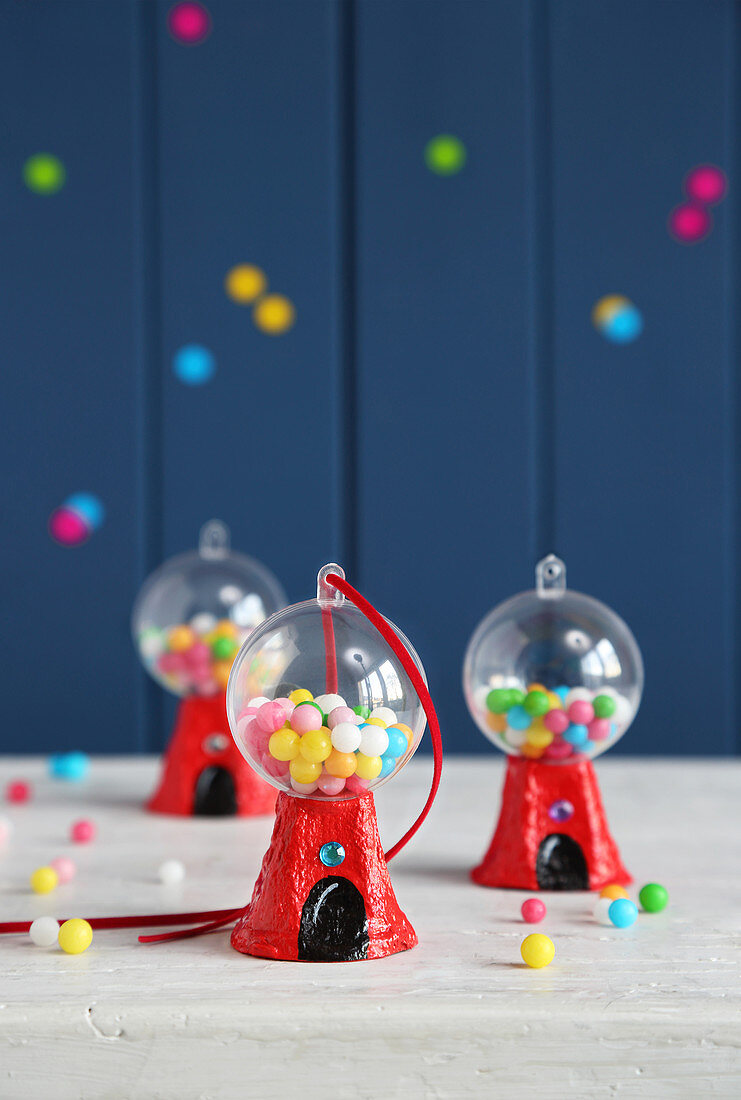 Miniature bubblegum machines as whimsical Christmas-tree decorations