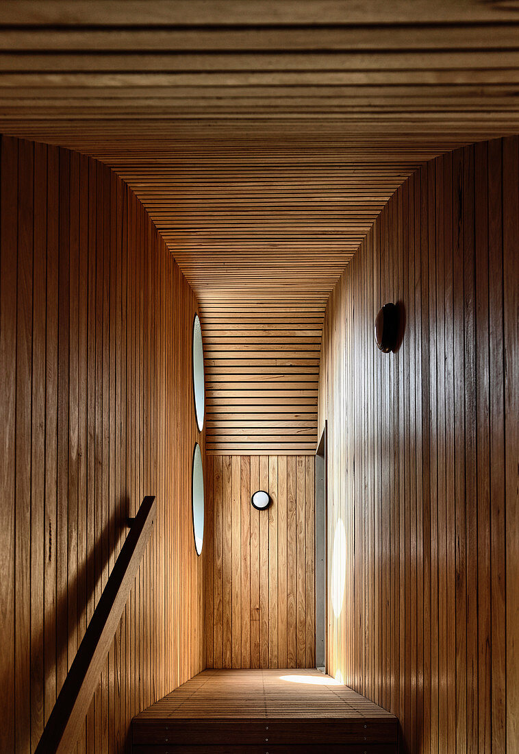 Landing on wood-panelled staircase
