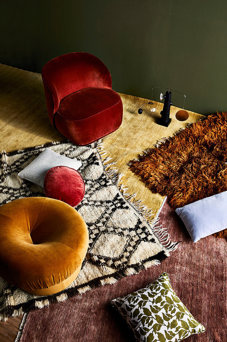 Seating with velvet upholstery and rugs