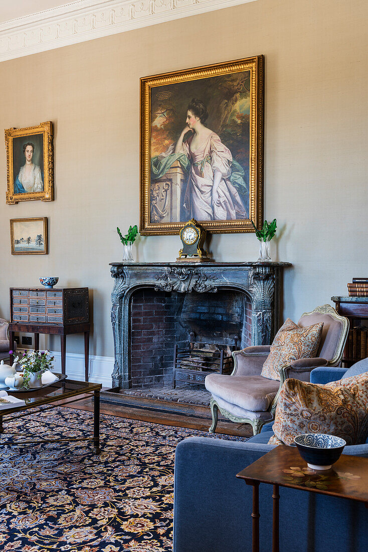 Portrait above fireplace in drawing room of 18th century mansion