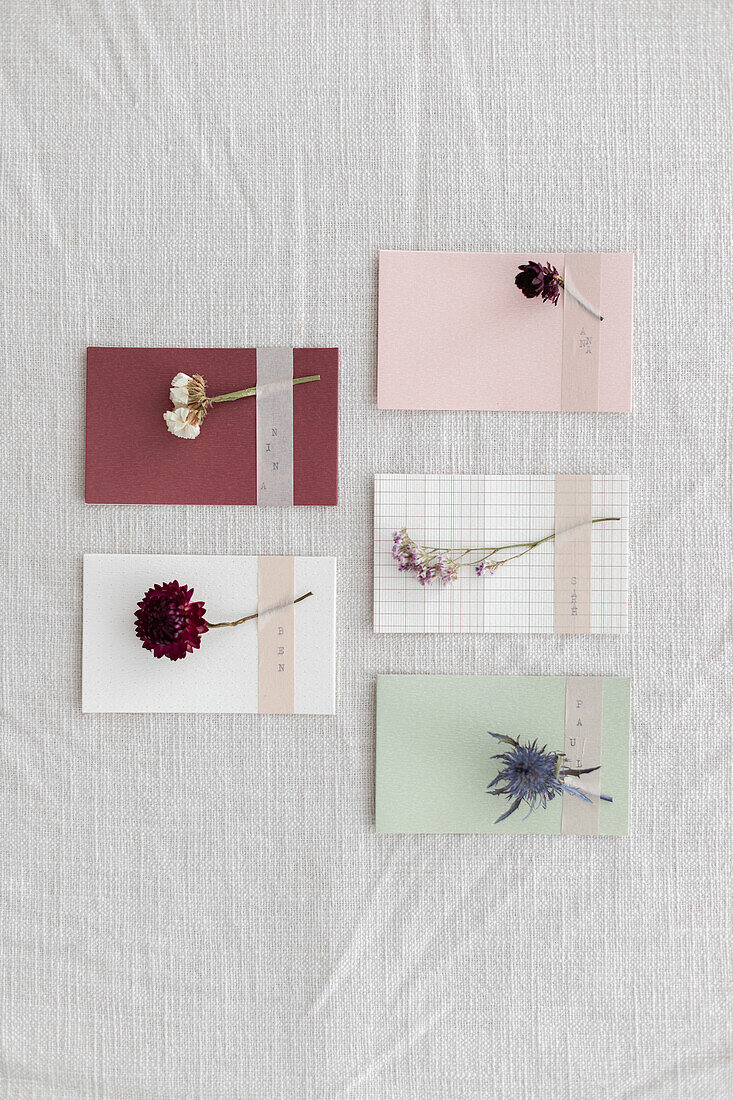 DIY place cards with washi tape and dried flowers