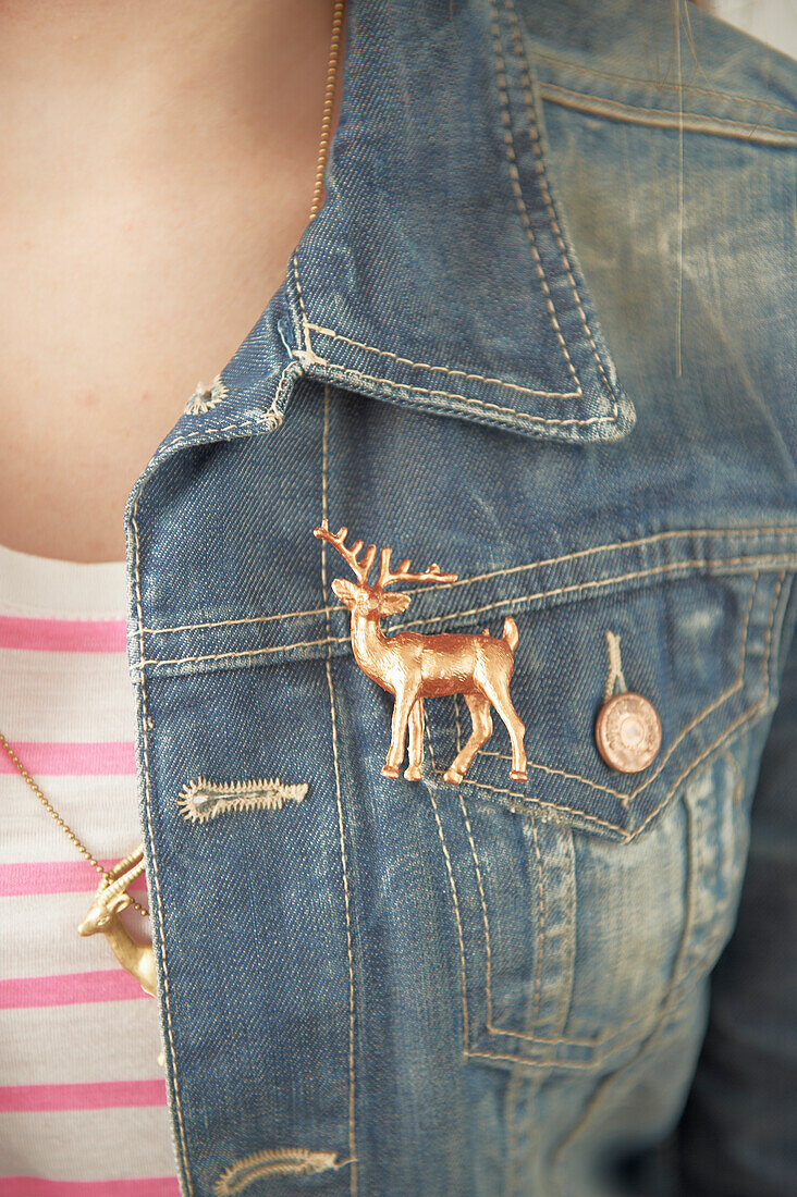 Reindeer brooch on a jean jacket