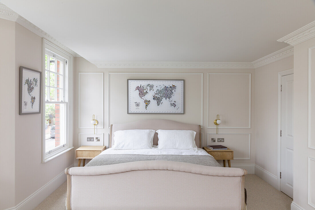 Double bed in elegant bedroom in beige tones