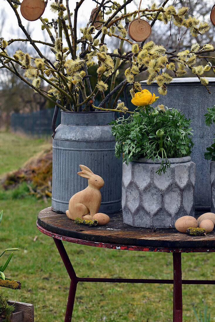 Rustic Easter arrangement with ranunculus and Easter bouquet of willow catkins