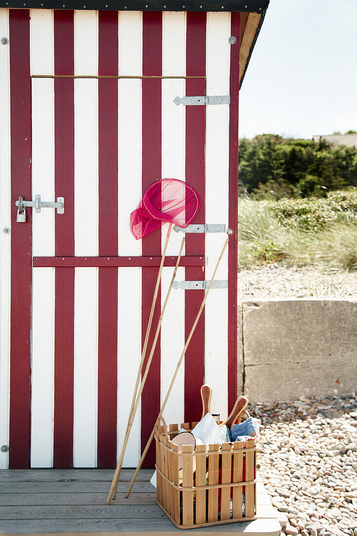 White and red dressing room on the beach