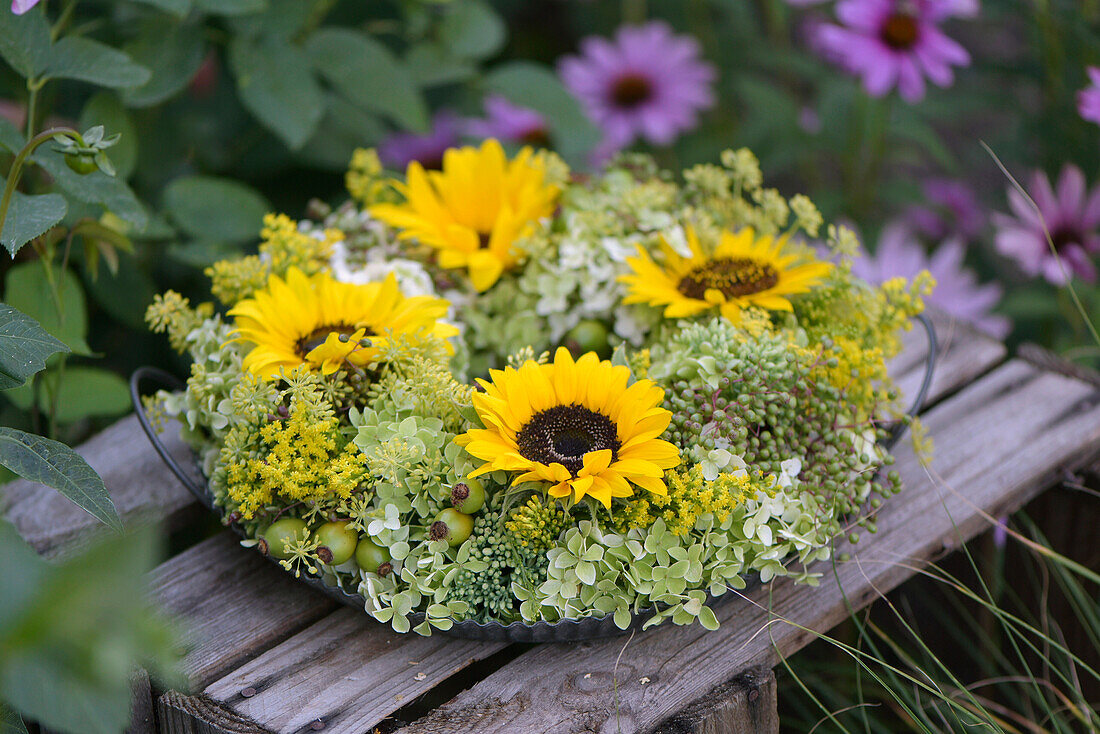 Wreath with sunflowers, elderberries and hydrangeas