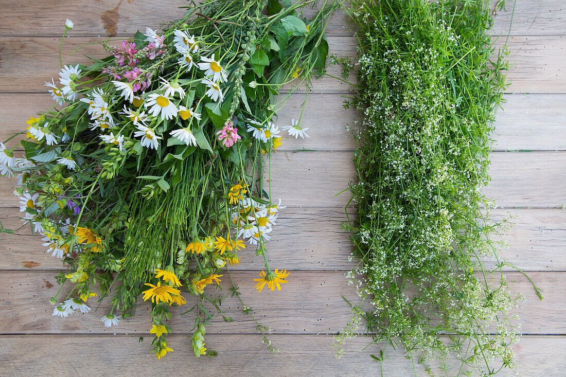 Wild flowers on a rustic wooden table