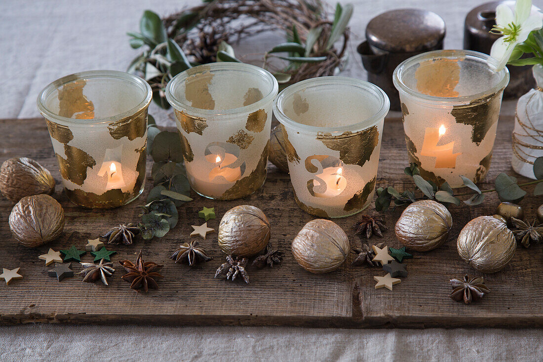 Advent arrangement with homemade tea light holders