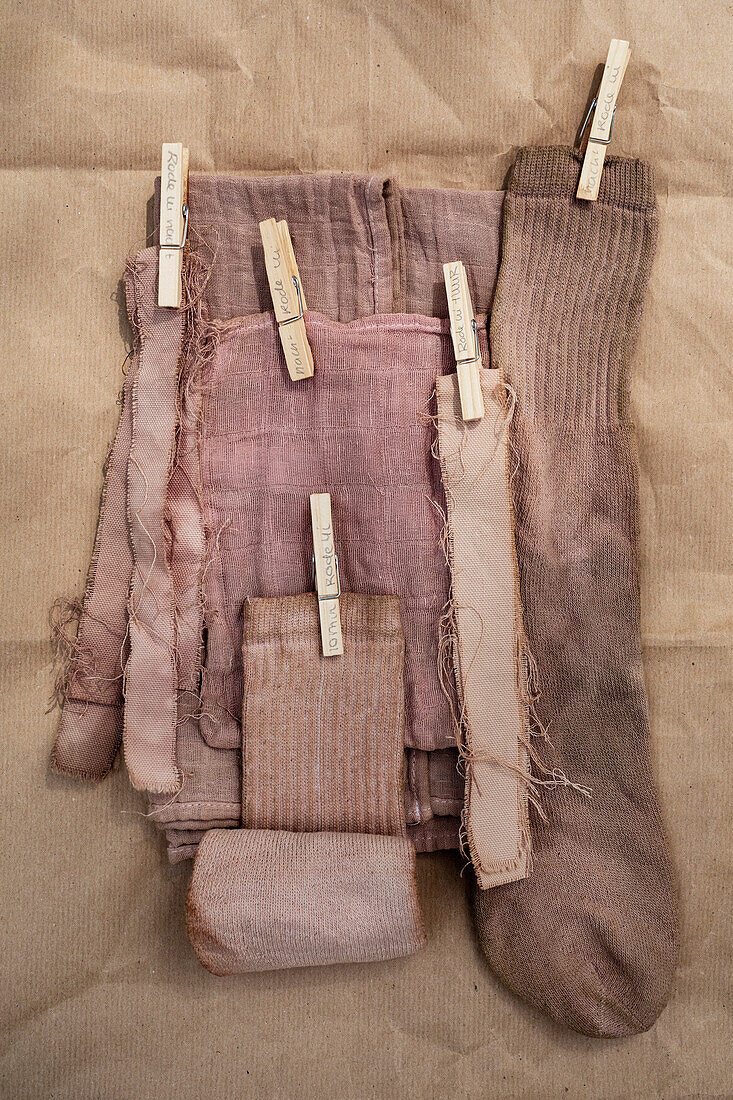 Fabrics and socks in brown, dyed with natural dye