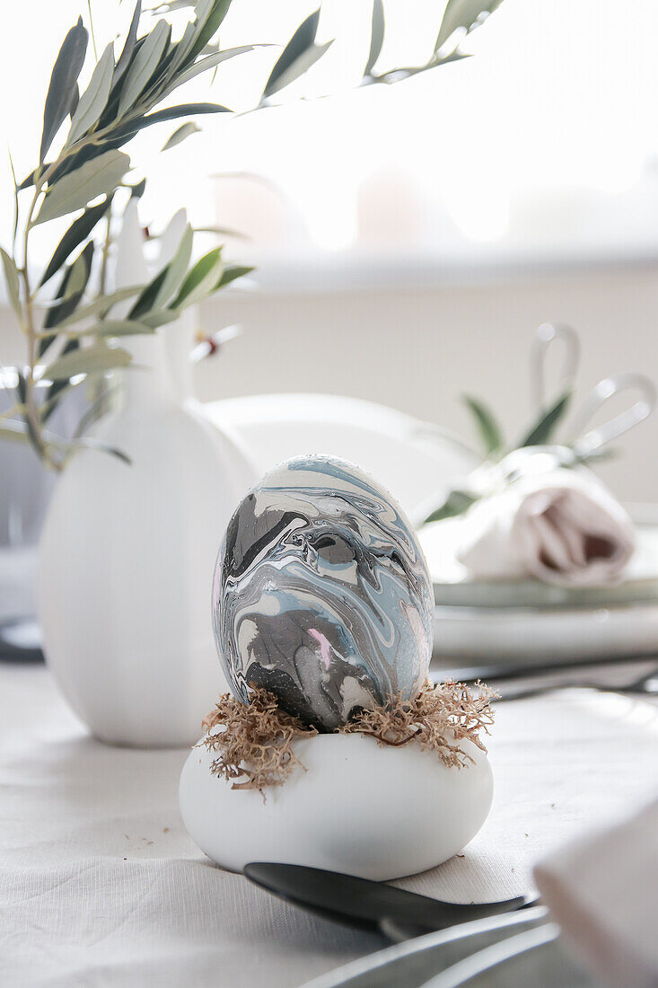 Marbled Easter egg on a table setting