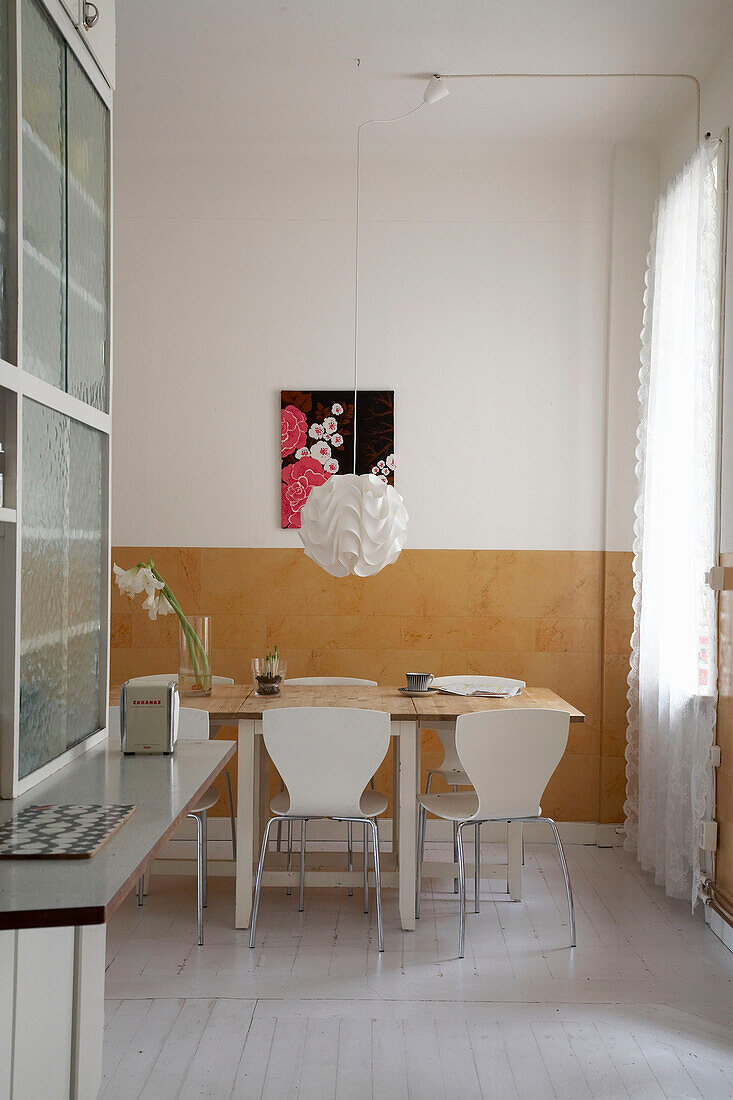 Open plan dining room of 20th century Stockholm apartment