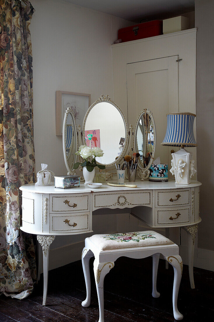 Dressing table with three way mirror