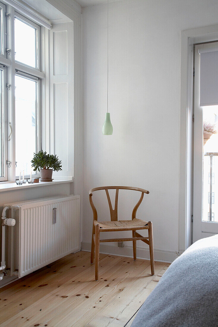 Wooden chair in modern simple bedroom