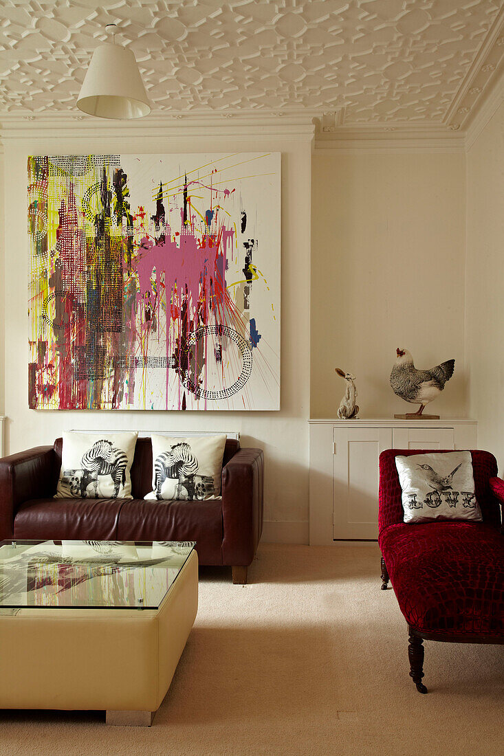 Seating are and modern art with Plasterwork in Brighton townhouse, Sussex, England, UK