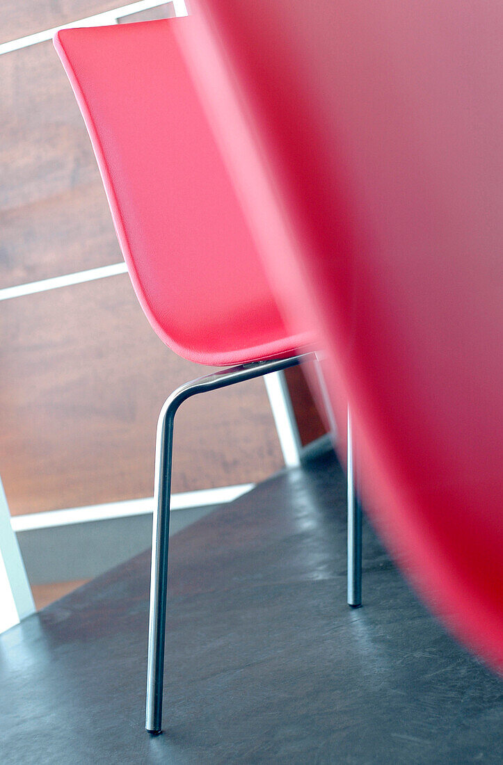 Metal chair legs on smoothed concrete floor