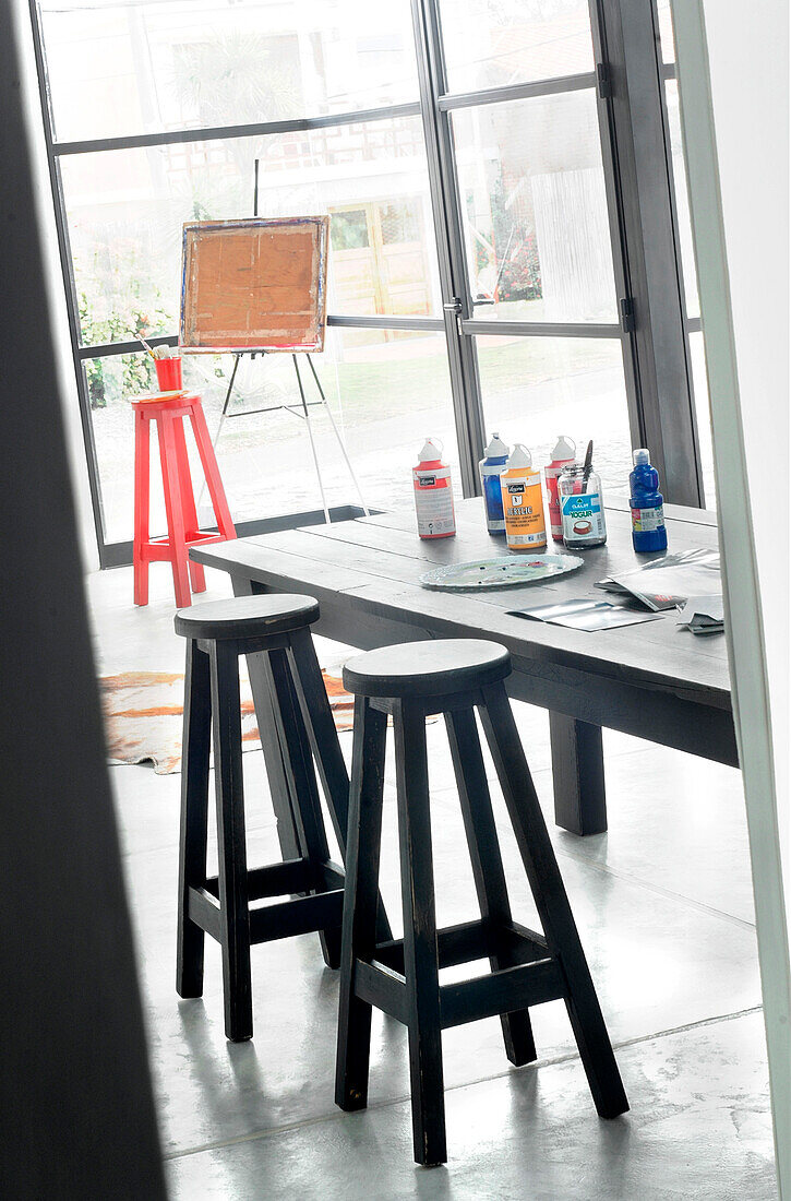 Artist's easel standing in corner of workshop