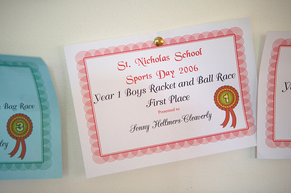 Children's certificate pinned on the wall
