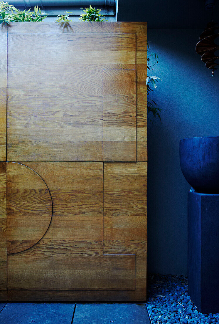 Wood grain on front door with aqua blue interior