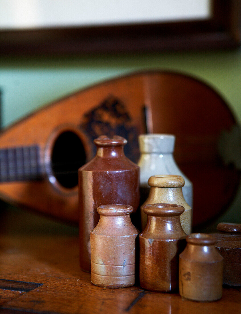 Still life with stone bottles and lute