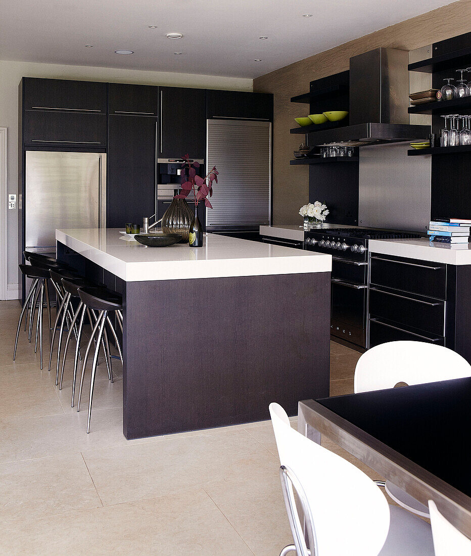Dark wood kitchen with an immaculate contemporary finish
