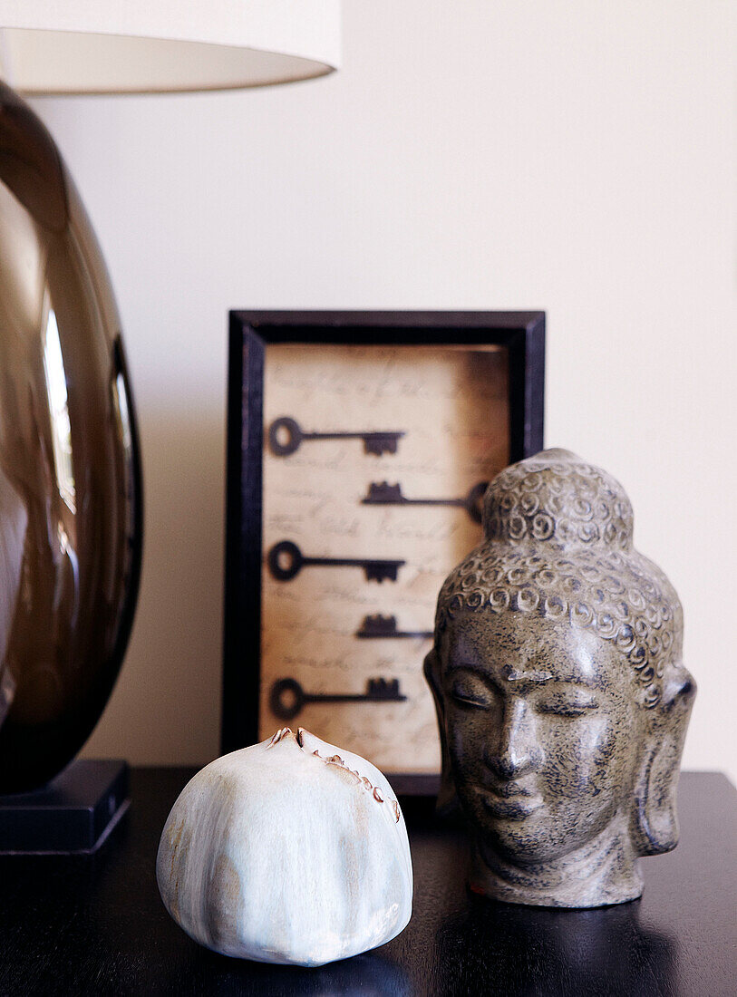 Buddhas Kopf und Schlüsselkunstwerk als Hausschmuck