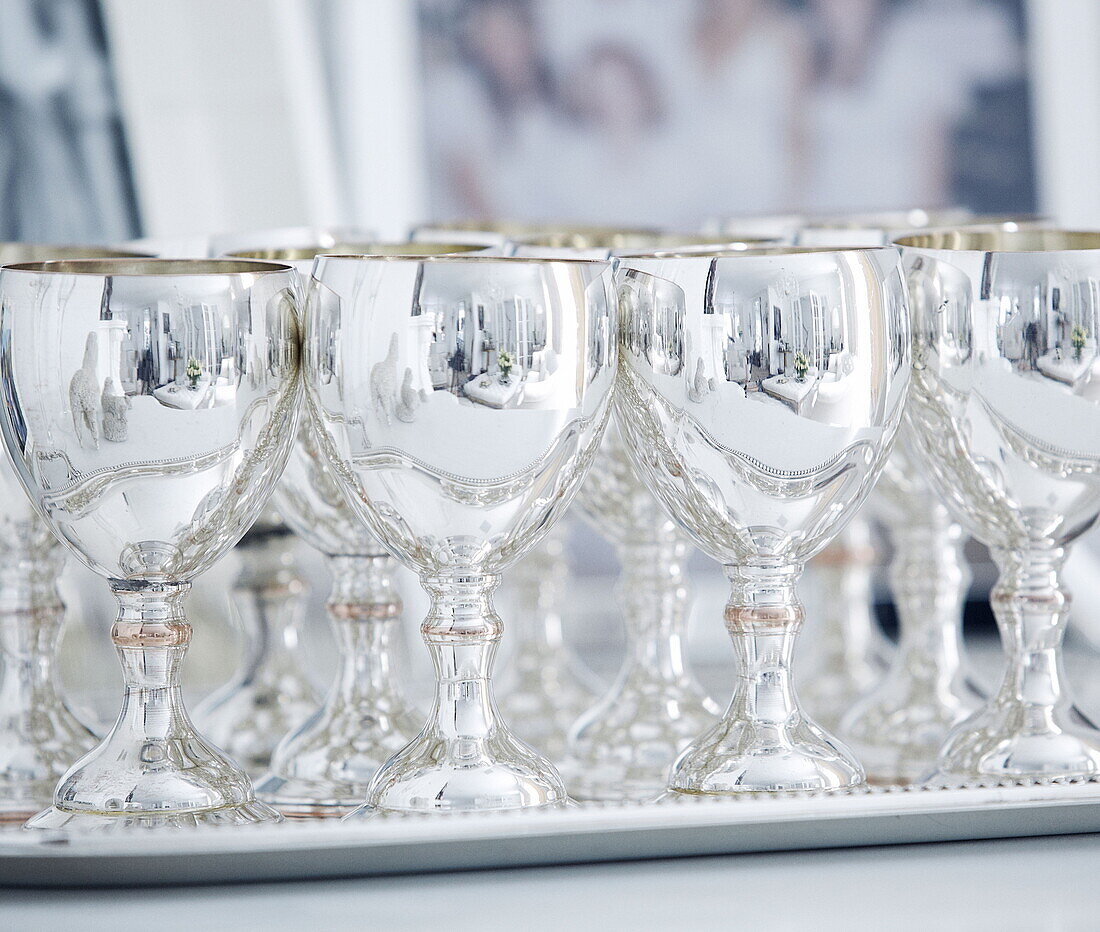 Silver goblets on a tray in London home UK