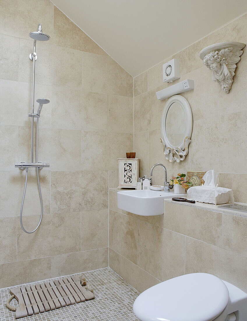 Bathroom detail wet room with shower fitting in Hexham country house Northumberland England UK
