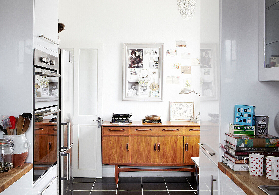 Vintage sideboard in open plan kitchen area in self-contained Hastings home, East Sussex, UK