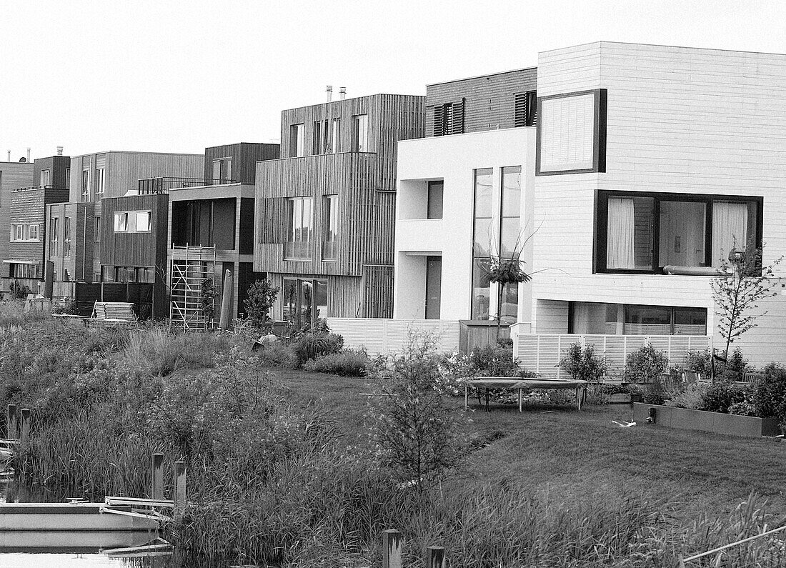 terraced riverside new build homes in Mattenbiesstraat, Near Amsterdam, Netherlands