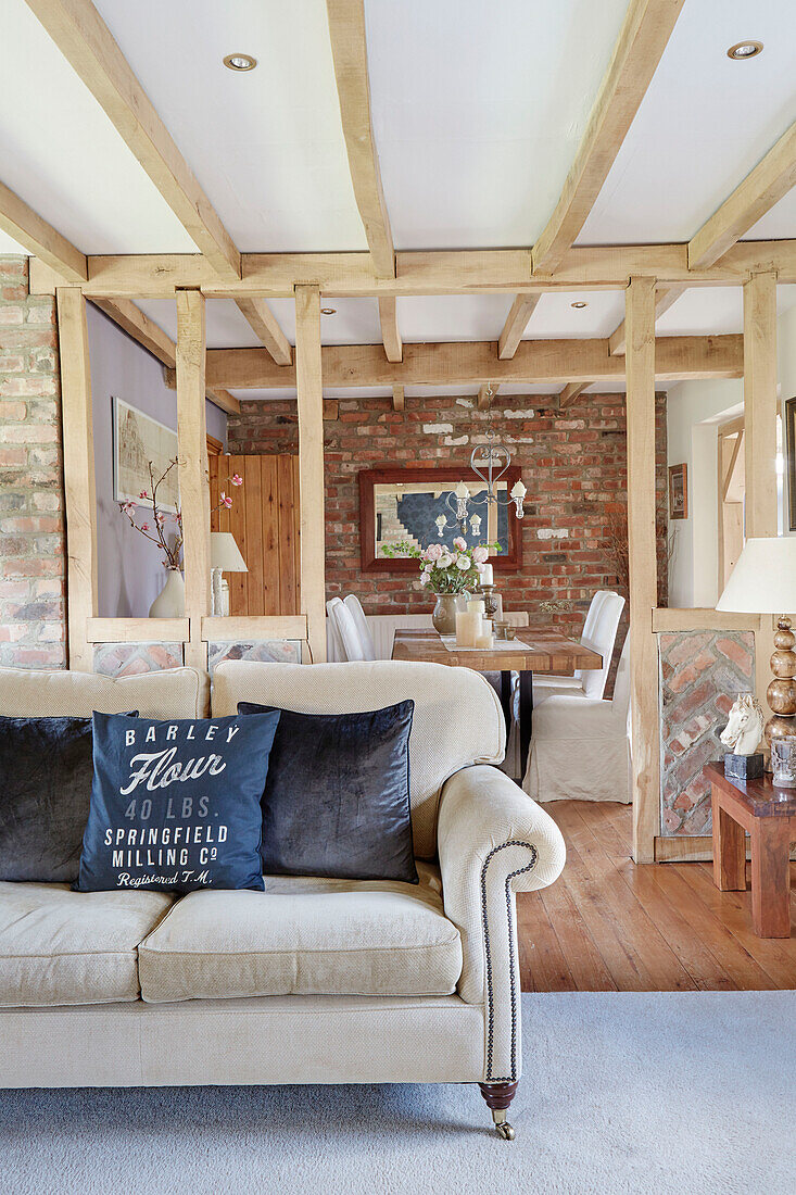 Timber framed interior of open plan living space in County Durham cottage, England, UK