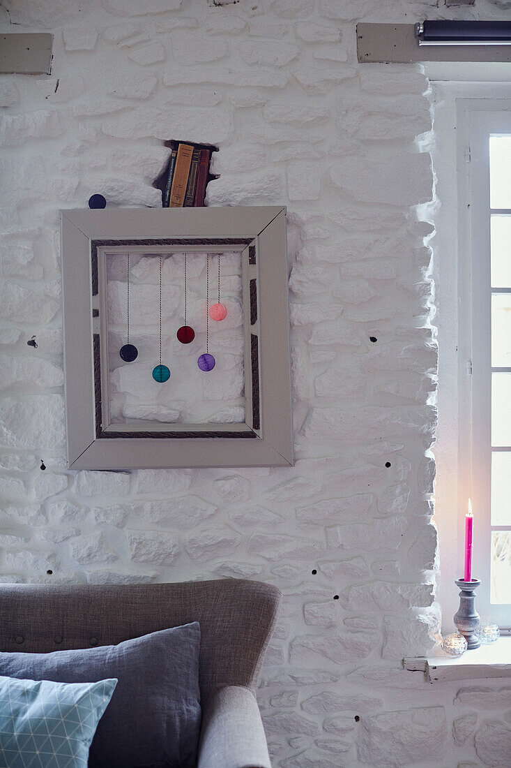 Modern art framed in whitewashed Brittany cottage, France