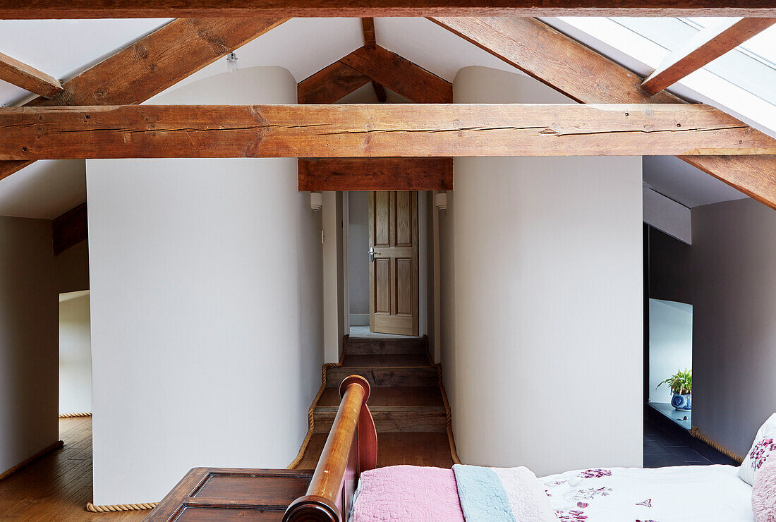 Beamed attic conversion in Northumberland farmhouse, UK