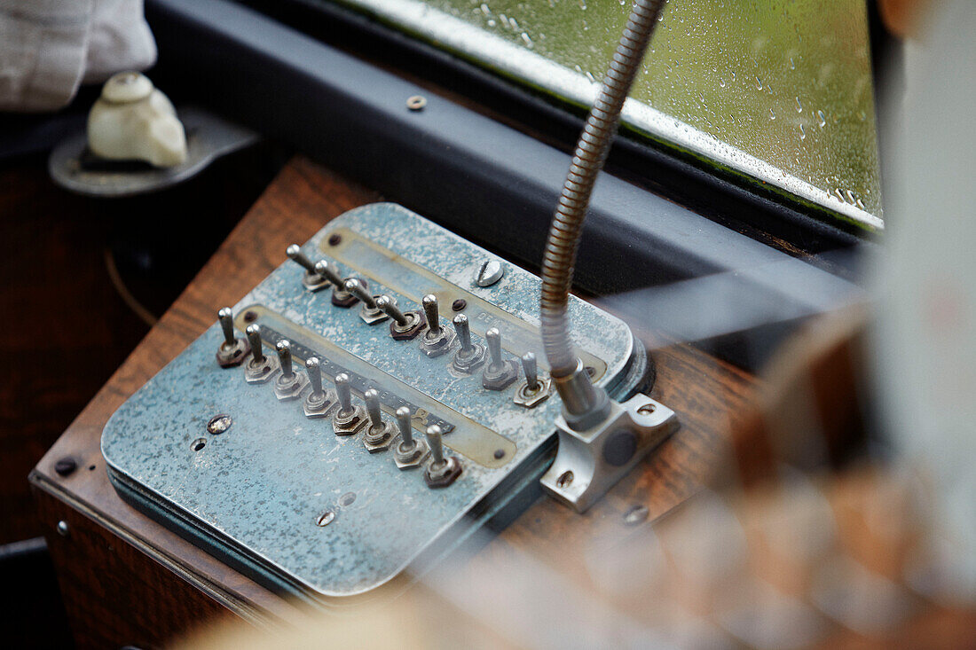 Switchboard inside The Majestic bus near Hay-on-Wye, Wales, UK