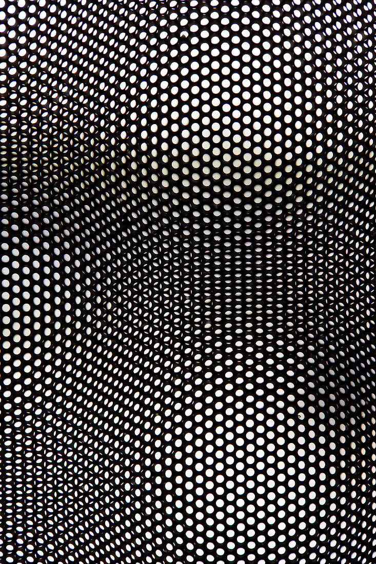 Mesh pattern in converted shipping container Bedford, UK