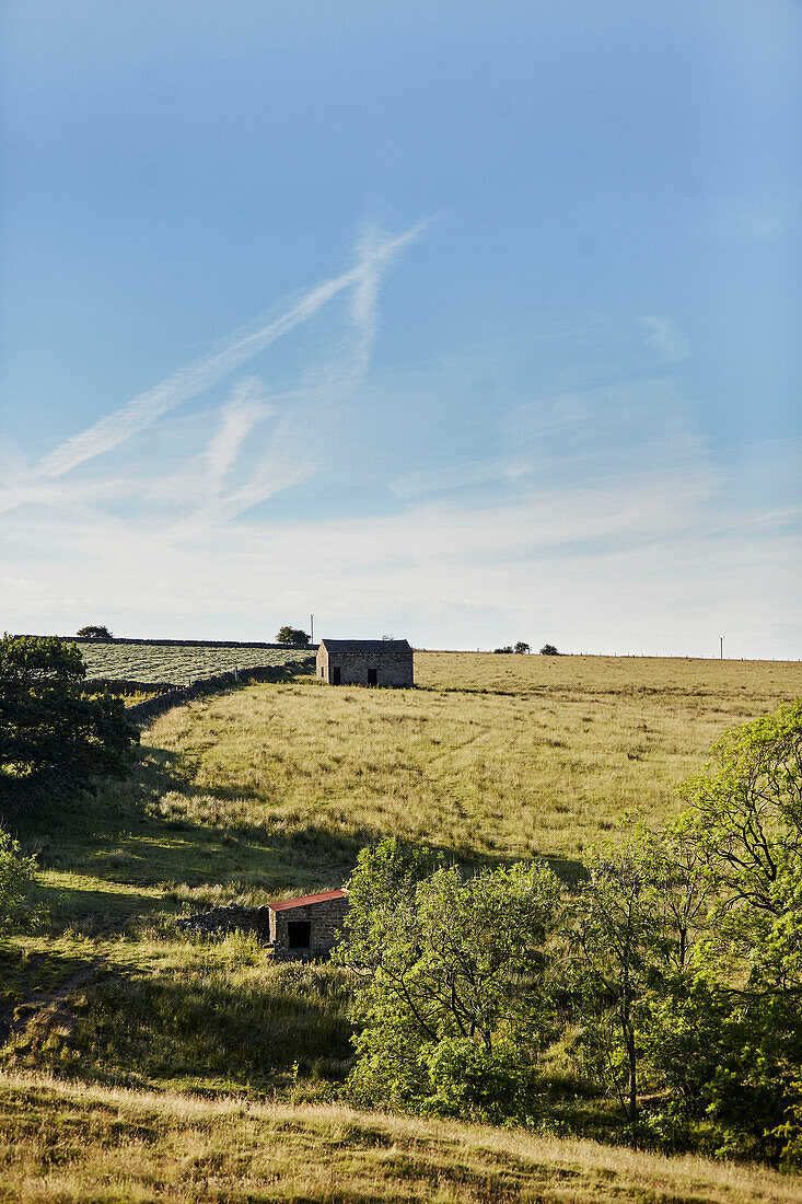 Old stone sheds in Yorkshire countryside, UK