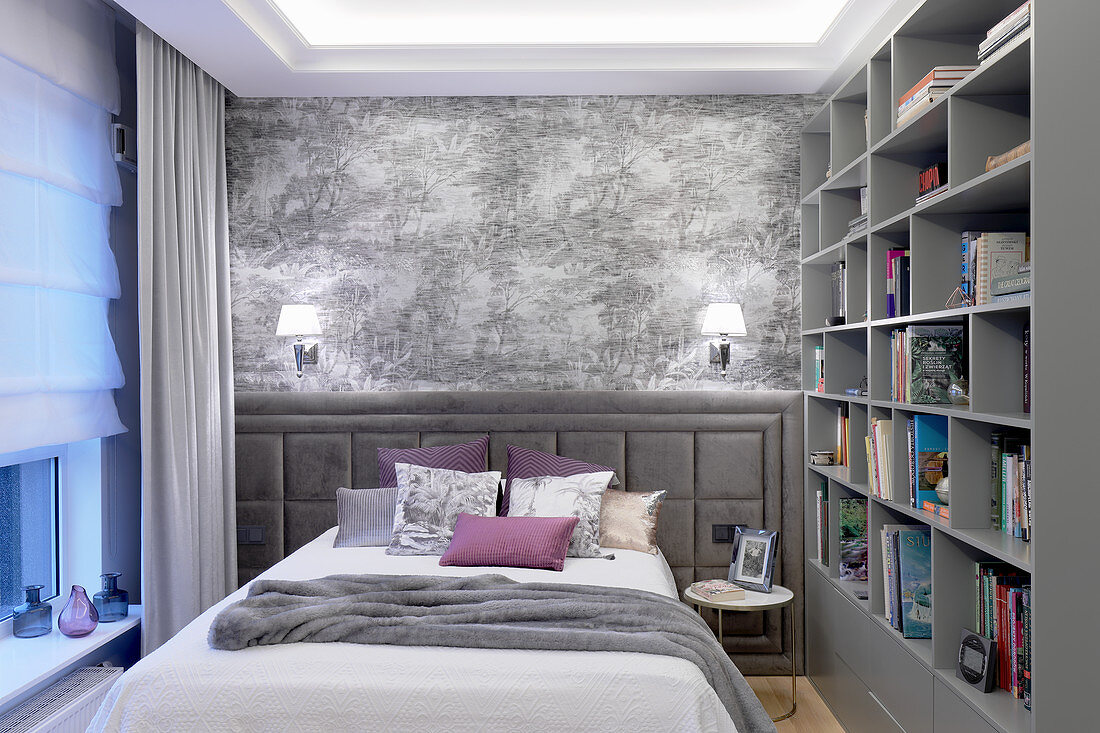 Shelving in small, classic bedroom decorated in grey