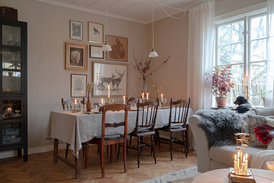 Dining table festively set for Christmas in living room