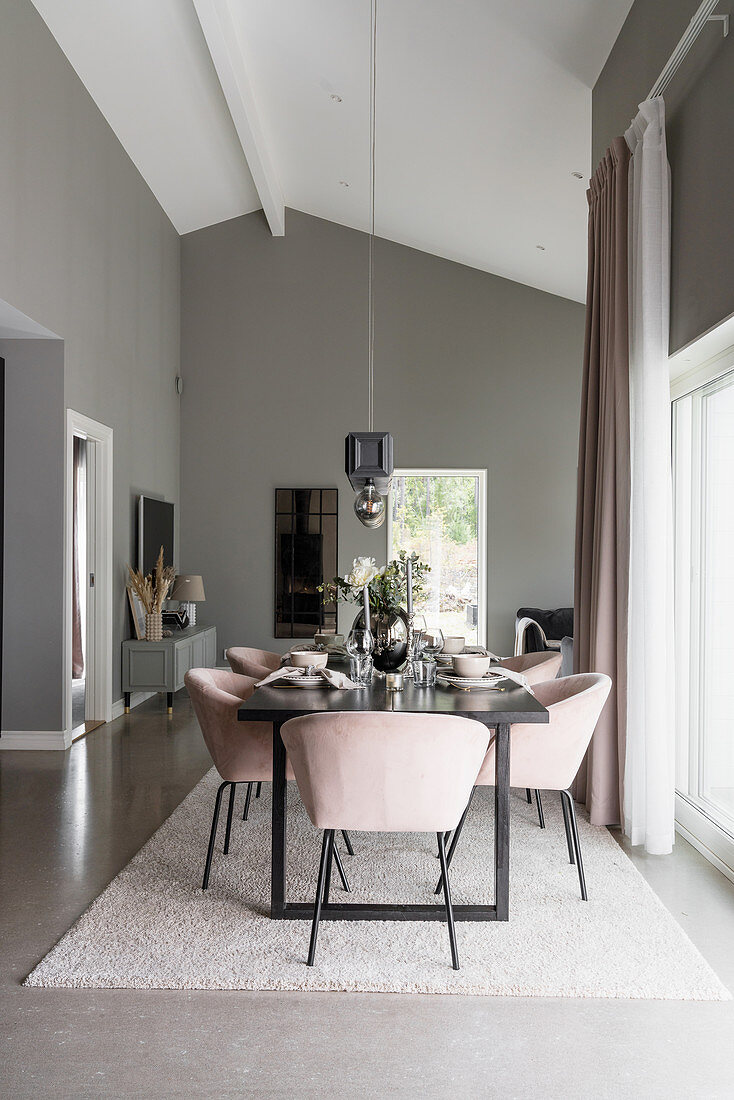 Dining table and pink shell chairs