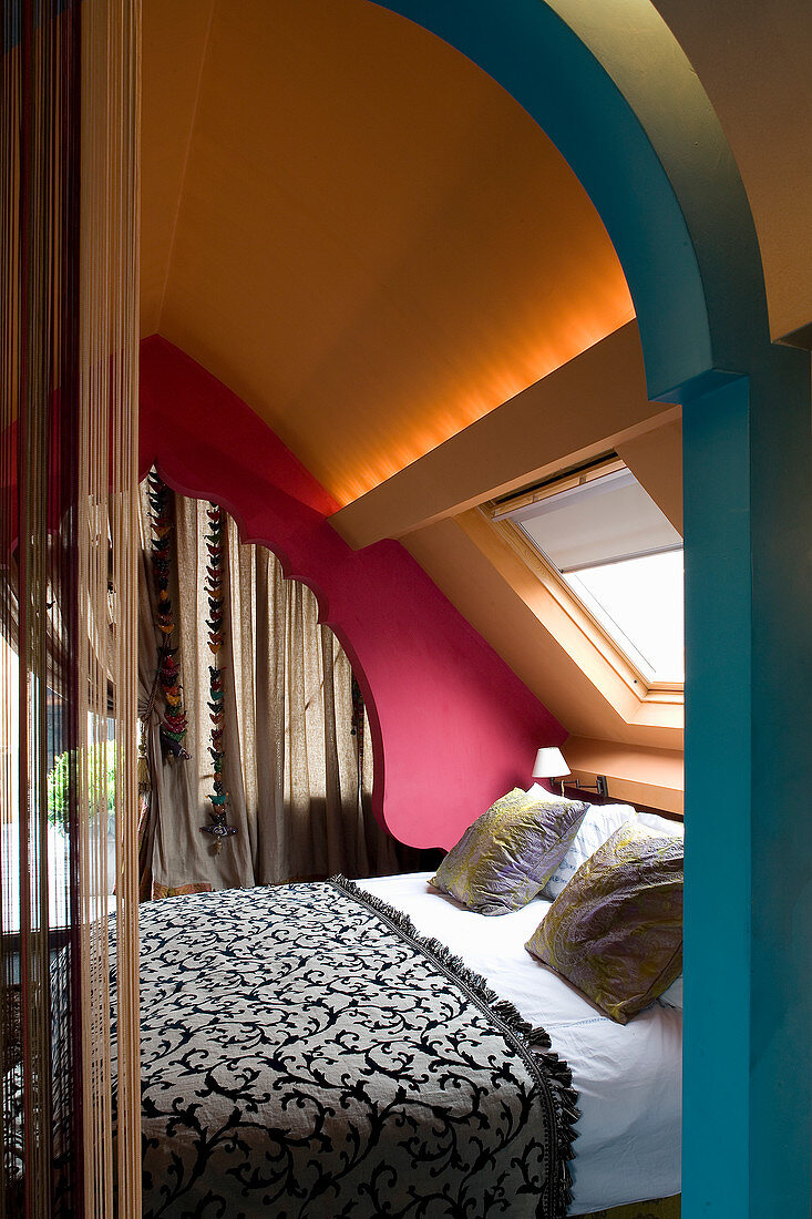 Double bed in Moroccan-inspired bedroom
