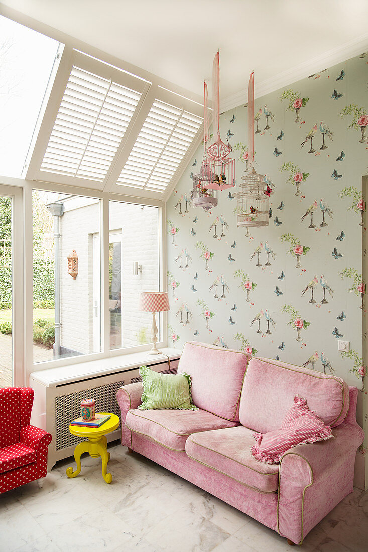 Pink Sofa Against Wallpaper With Bird Buy Image 13280034 Living4media