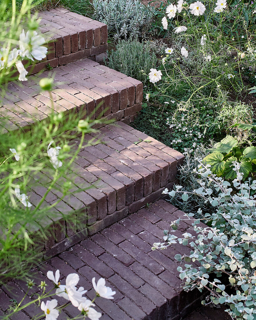 Brick steps in natural-style garden