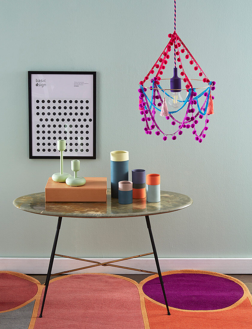 A DIY hanging lamp with vintage pompoms and tassels
