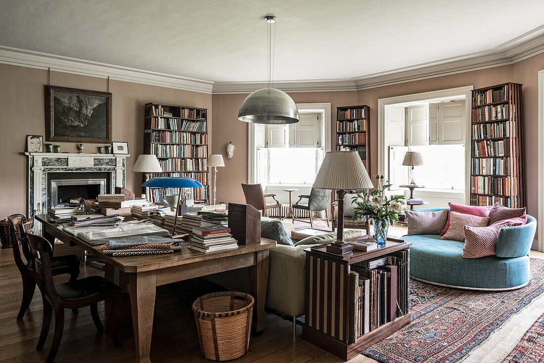 Classic living room with desk and bookshelves