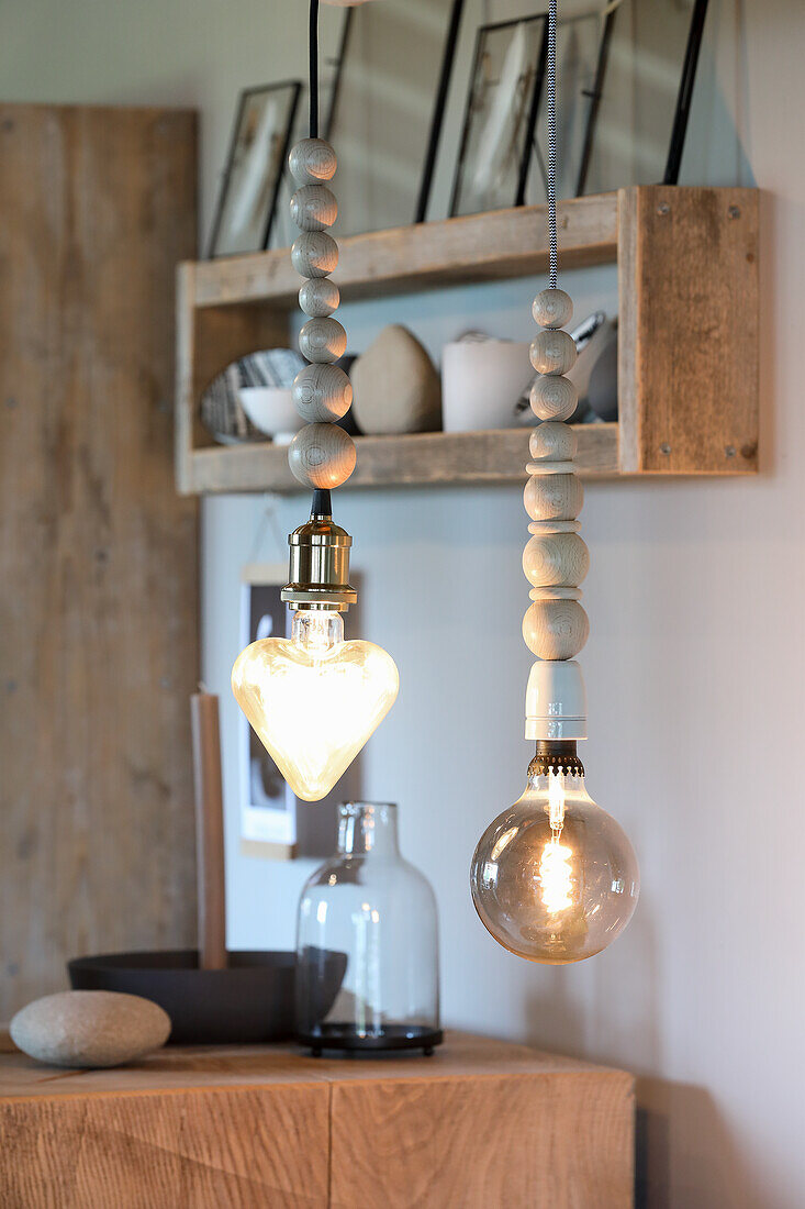 DIY hanging pendant lights with wooden globes and LED filament