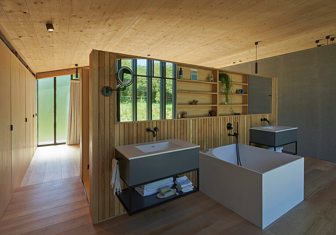 Modern bathroom in Japanese style with wooden panelling