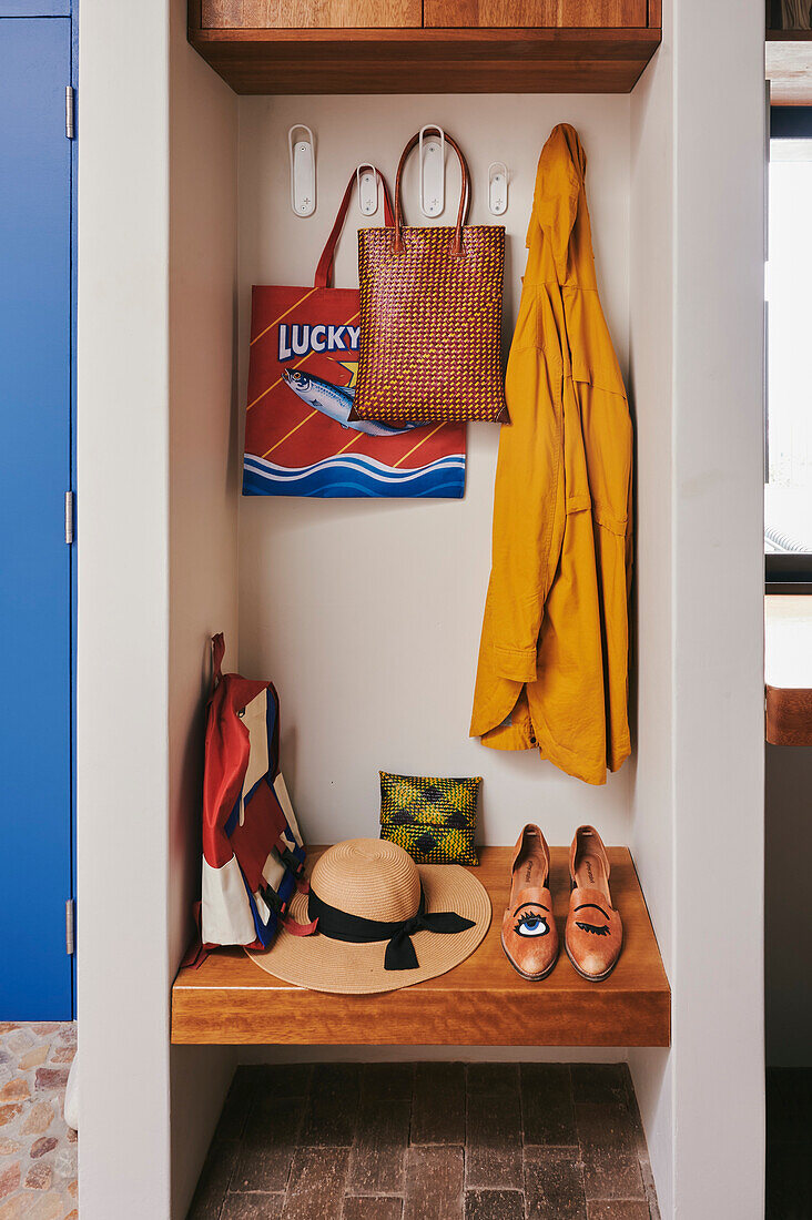 Small closet area with wooden elements