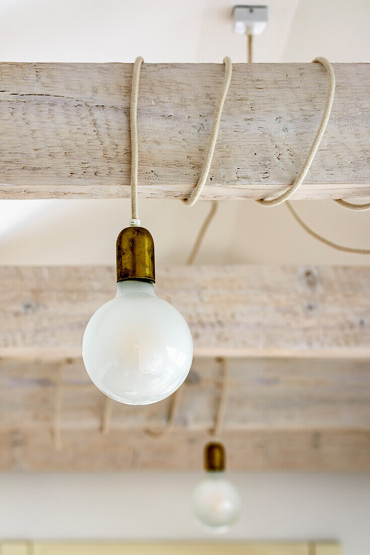 Ceiling beams with pendant lights