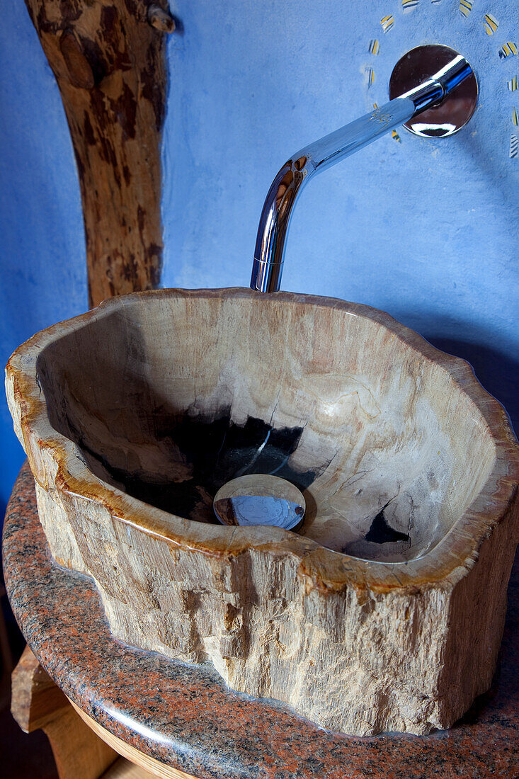 Sink made out of petrified wood