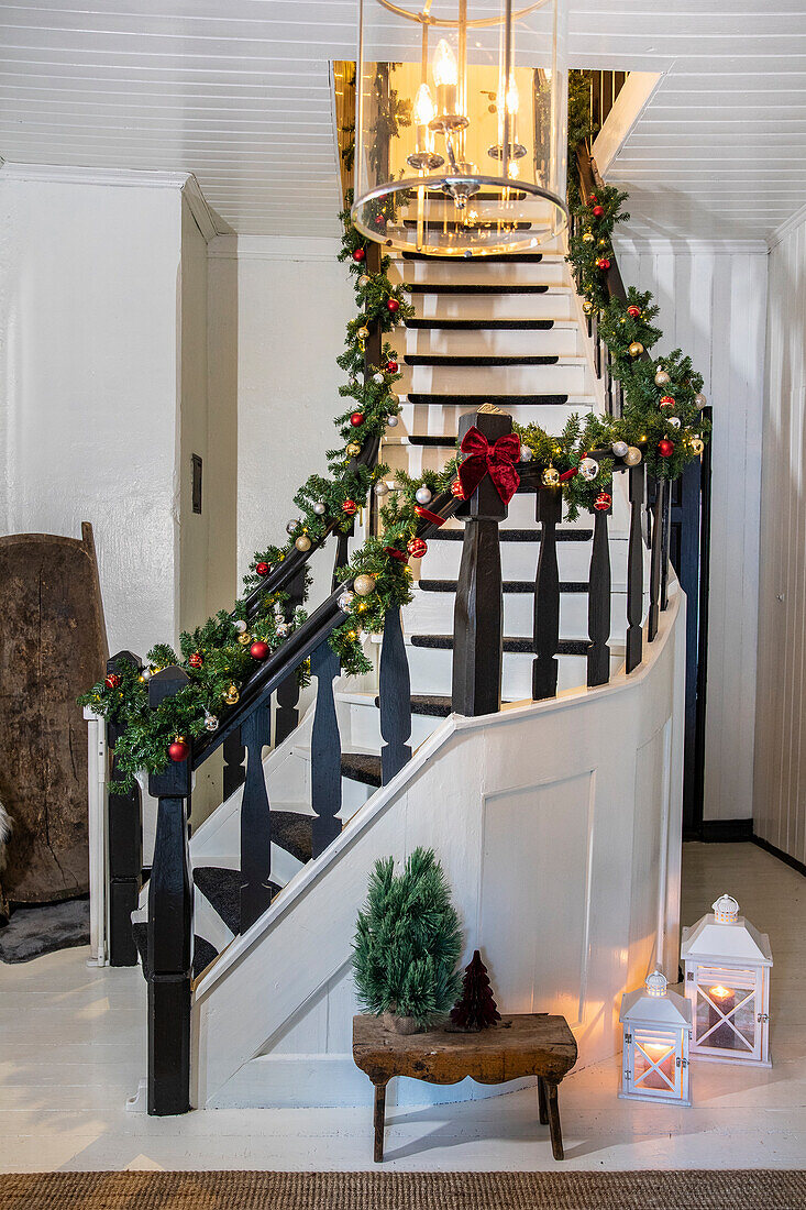 Staircase banister decorated for Christmas